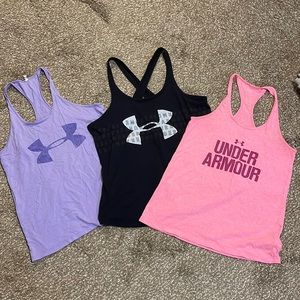 Lot of Under Armour tank tops.